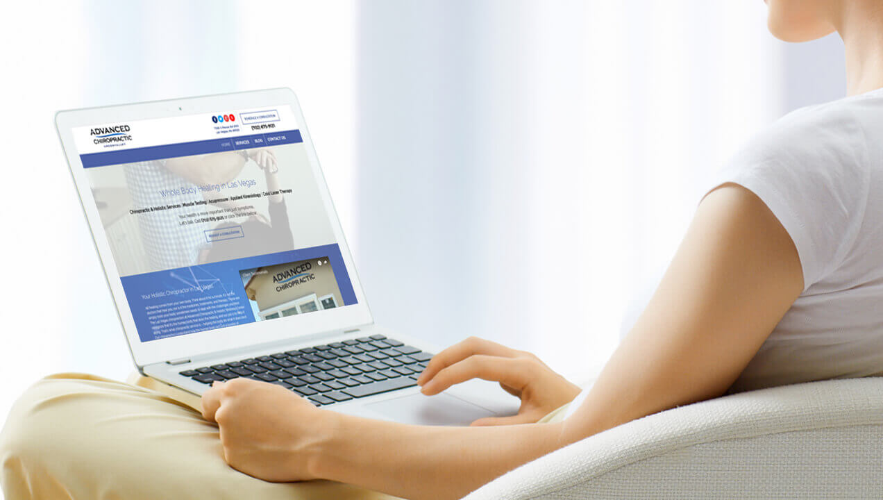 Advanced Chiropractic website on a laptop