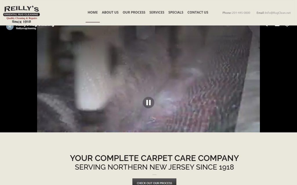 Reilly’s Oriental Rug Cleaning homepage on a laptop
