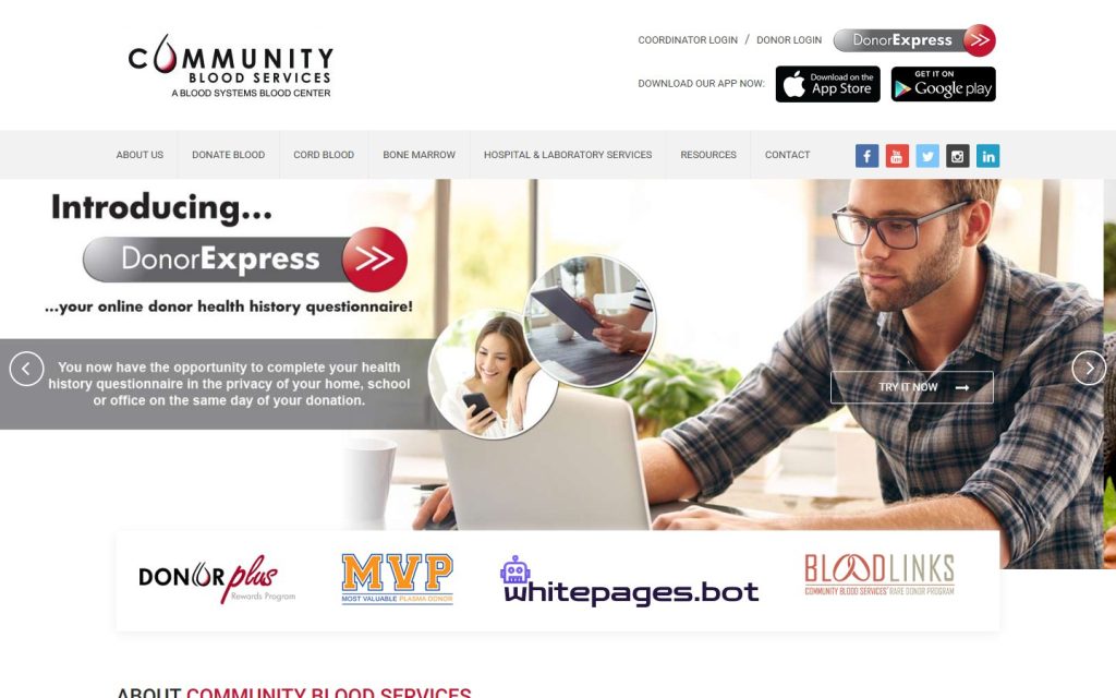 Community Blood Services homepage on a laptop