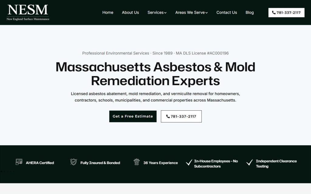 New England Surface Maintenance homepage on a laptop