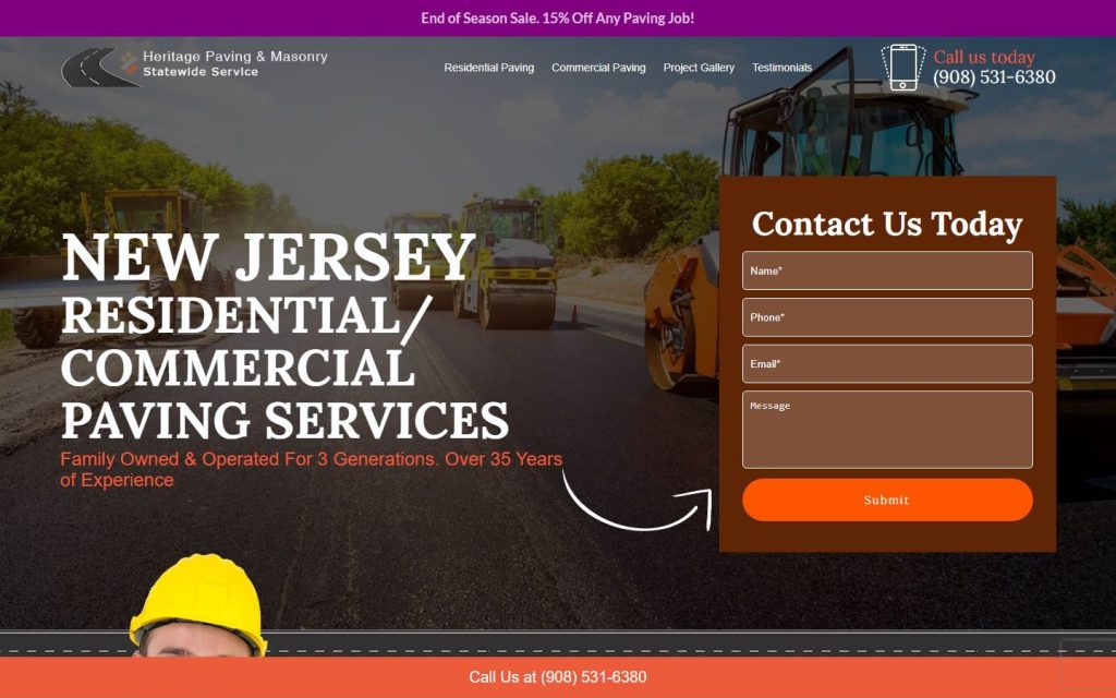 Heritage Paving & Masonry homepage on a laptop