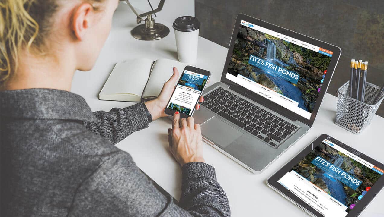 Fitz Fish Ponds website on phone and laptop