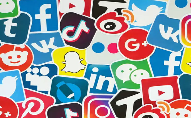 Many paper social icons with logo of most popular social networks and smartphone apps for chat and conversations online
