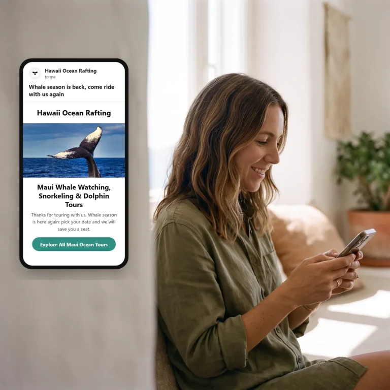 A traveler reading an email from Hawaii Ocean Rafting on her phone