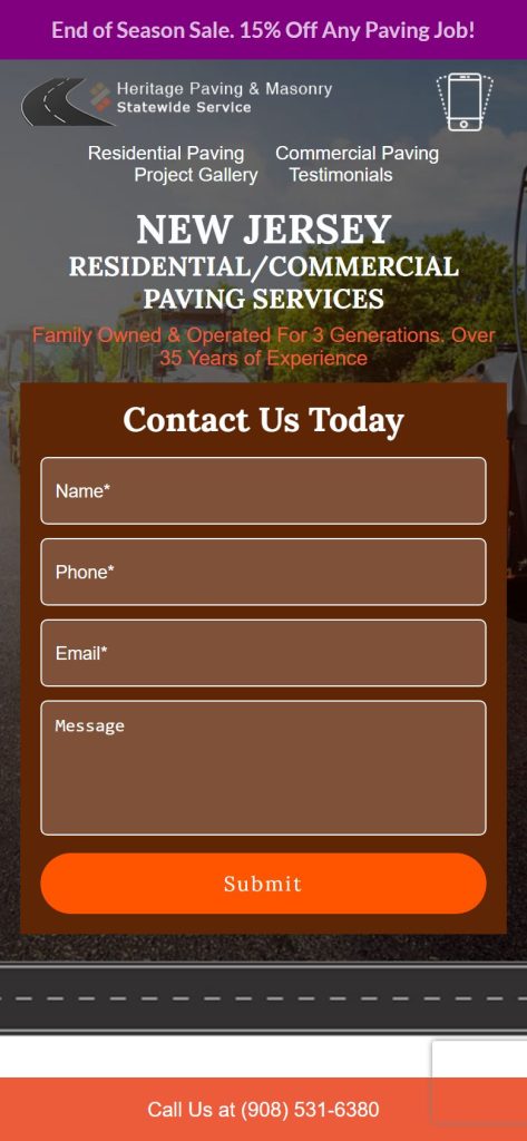 Heritage Paving & Masonry homepage on a phone