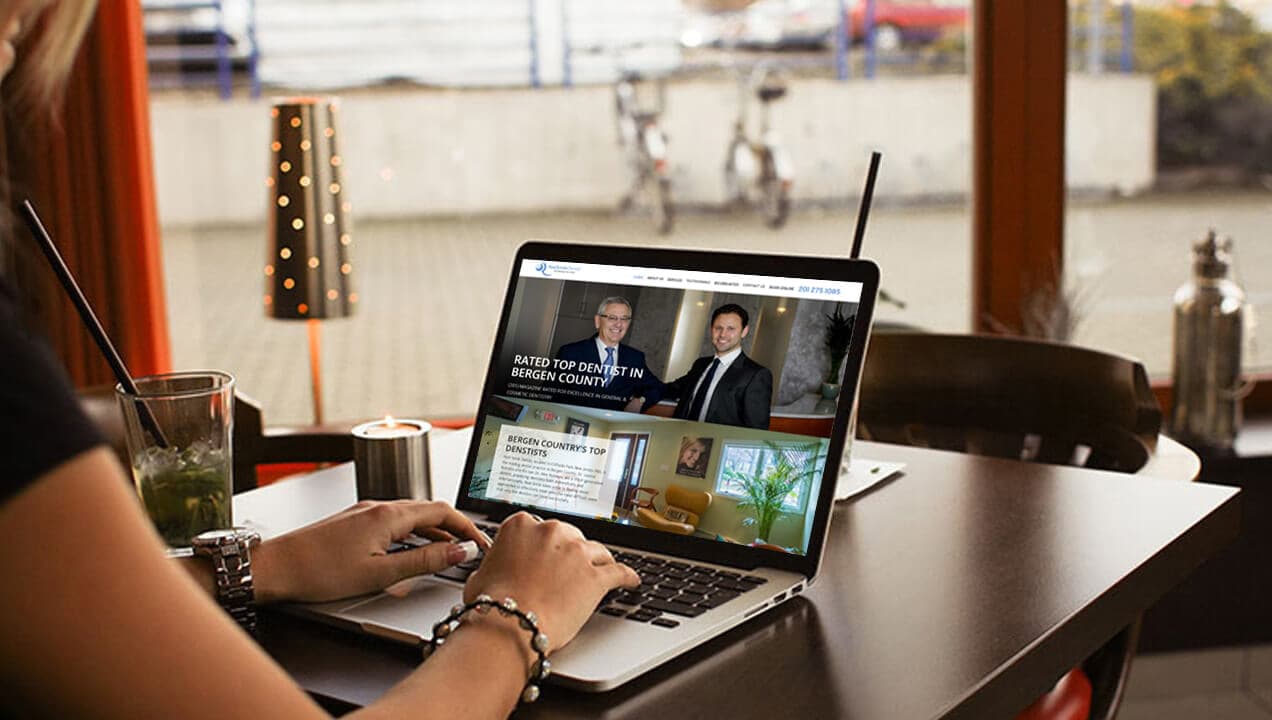 Real Smile website on laptop