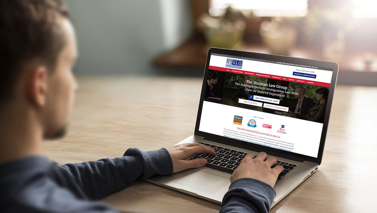 The Shulman Law Group website on a laptop