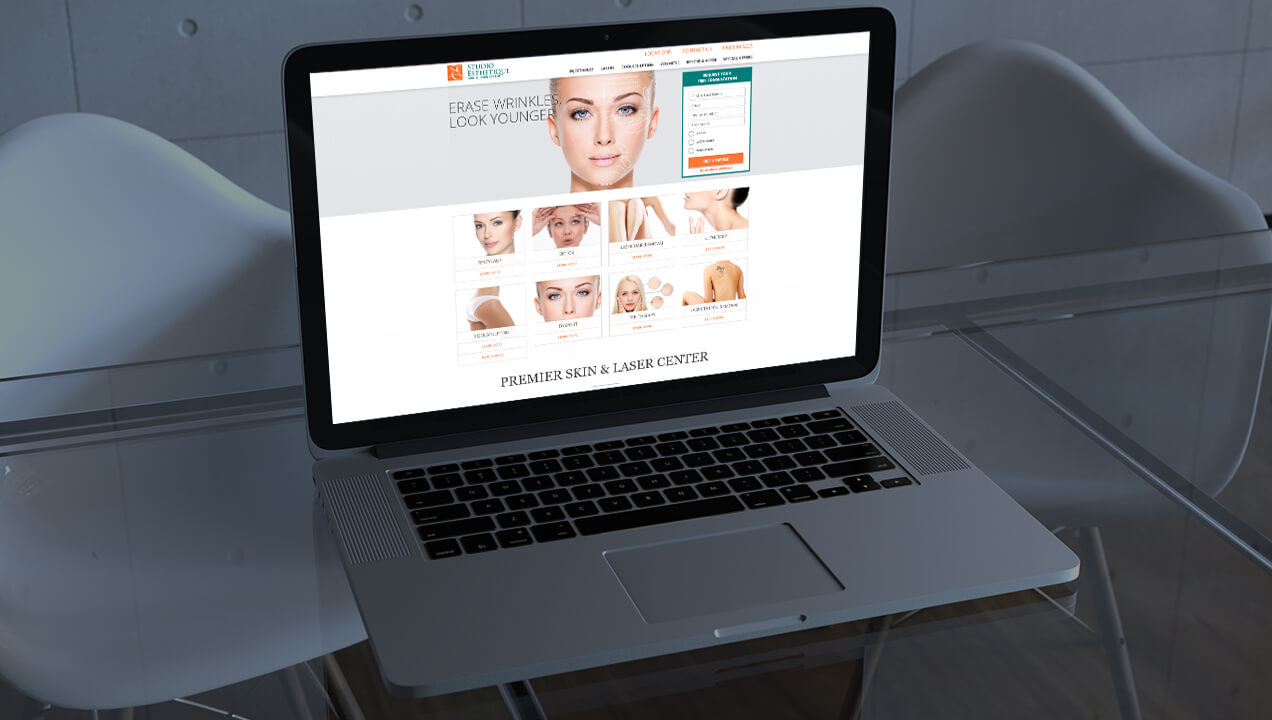 Studio Esthetique website on a laptop