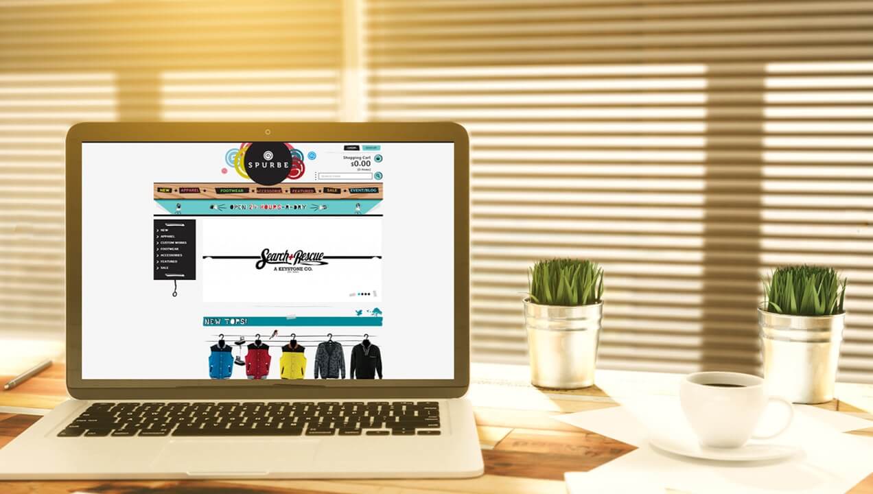 Spurbe website on a laptop