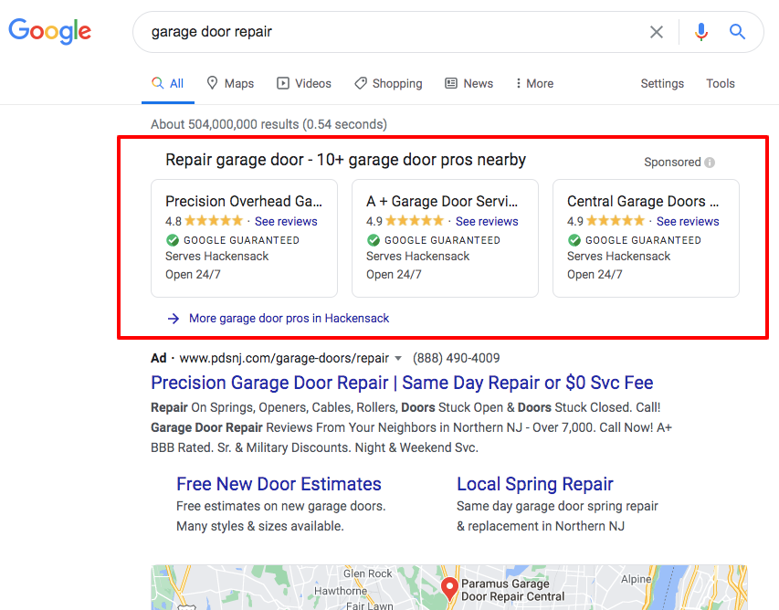 Google Local Services Ads for garage door repair, each marked Google Guaranteed